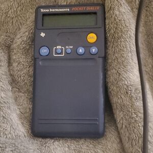 Texas Instruments Blue Pocket Device with Yellow and Gray Buttons